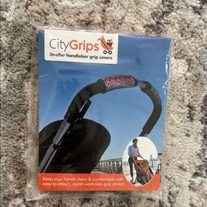 Black and Pink Wearable Stroller Handlebar Covers